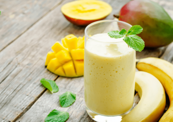 Healthy Gut Soothing Turmeric Smoothie made with easily obtainable fresh fruits and turmeric for anti-inflammatory soothing of the gut.

