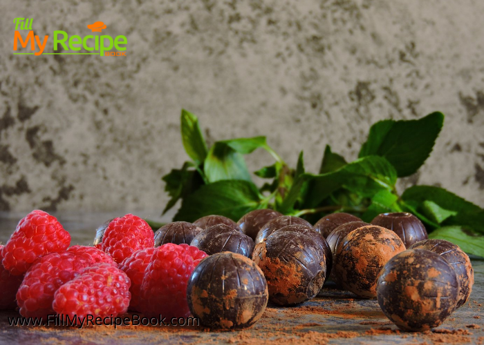Raspberry Dark Chocolate Truffles. A no bake recipe to easily make with freeze dried and powdered raspberries, dark chocolate rolled in cocoa.