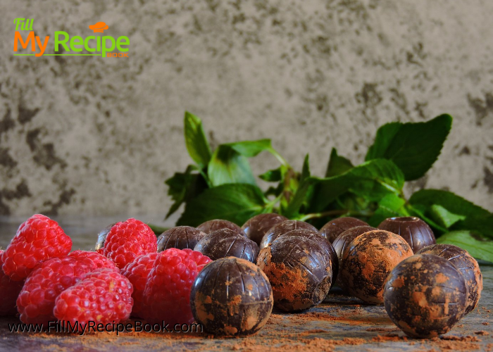 Raspberry Dark Chocolate Truffles. A no bake recipe to easily make with freeze dried and powdered raspberries, dark chocolate rolled in cocoa. 