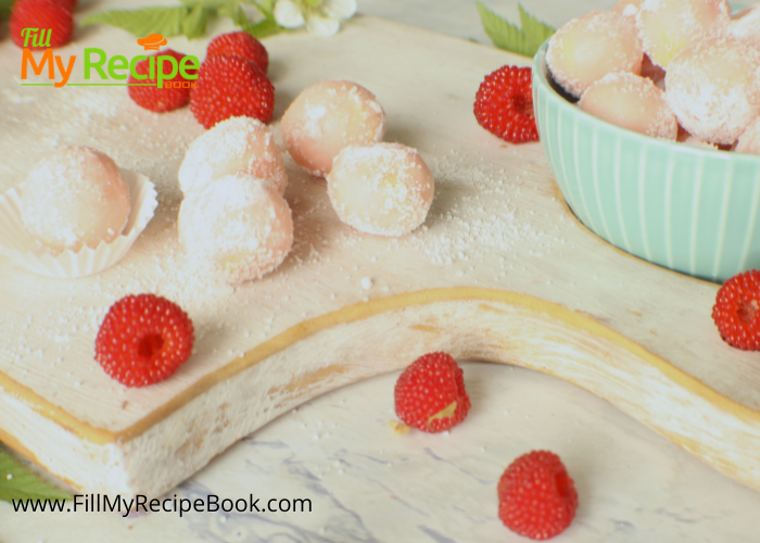 Raspberry White Chocolate Truffle balls recipe rolled in castor sugar. An easy no bake pink Candy dessert to serve for snacks or gifts.