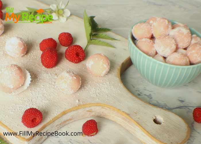 Raspberry White Chocolate Truffle balls recipe rolled in castor sugar. An easy no bake pink Candy dessert to serve for snacks or gifts.