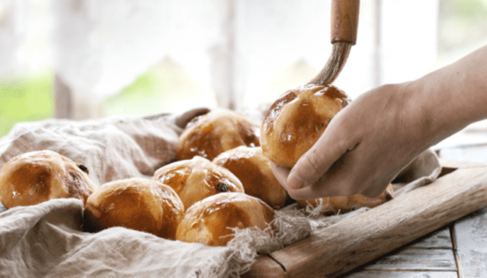 Best Hot Cross Buns with a white cross on representing easter on a good Friday.