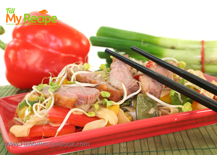 Crispy Chinese Duck Breast with noodles and sauce. Make this easy and tasty seared duck breast with alfalfa sprouts and sauté bell peppers.