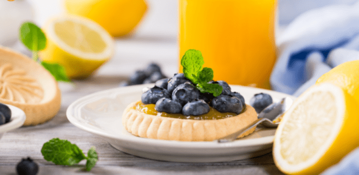 Lemon Curd & Blueberry Tartlets made with buttery shortbread crusts, a sweet but tangy lemon curd filling topped with blueberries dessert.