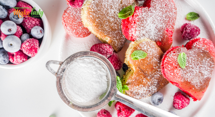 Mini Heart Pancakes with Berries recipe idea. An easy special breakfast to cook are heart shaped pancakes with raspberries and blueberries.