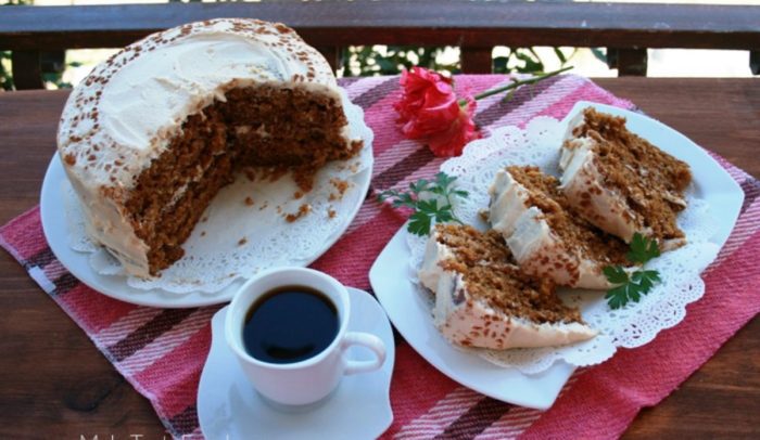 Tasty Moist Carrot Cake recipe. A favorite oven bake with crushed pineapple, desiccated coconut. With fluffy cream cheese frosting.
