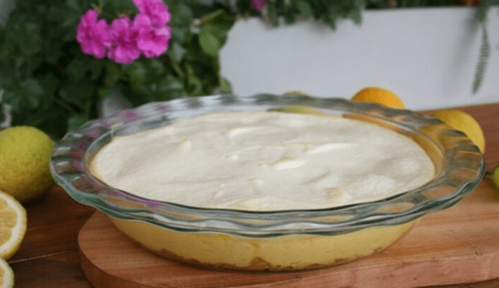 Easy Lemon Meringue Tart recipe. A biscuit base, condensed milk and fresh squeezed lemon juice and with meringue as a oven baked dessert.