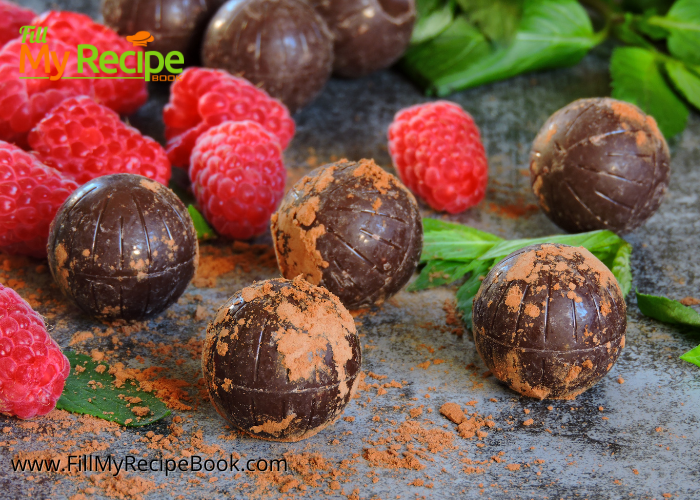 Raspberry Dark Chocolate Truffles. A no bake recipe to easily make with freeze dried and powdered raspberries, dark chocolate rolled in cocoa.