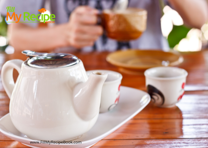 Traditional Irish Breakfast Tea Recipe in a large pot. Best full ulster fry Irish breakfast with brewed morning tea and cream idea.