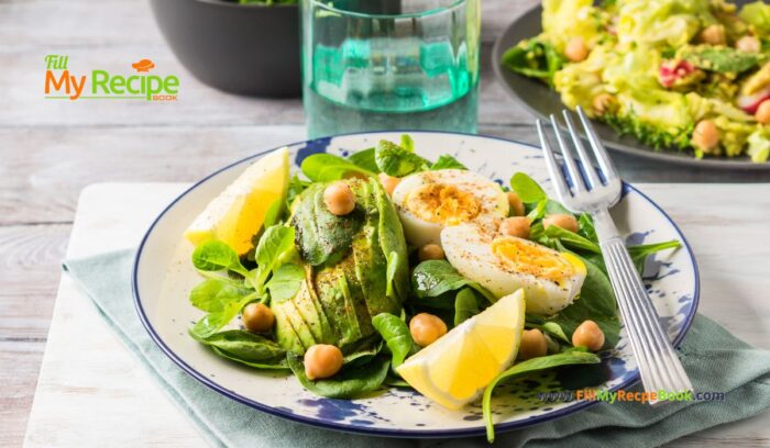 Avocado Spinach Chickpeas Eggs Salad recipe idea for a protein filled lunch that is ready in five minutes, drizzled with lemon and olive oil.