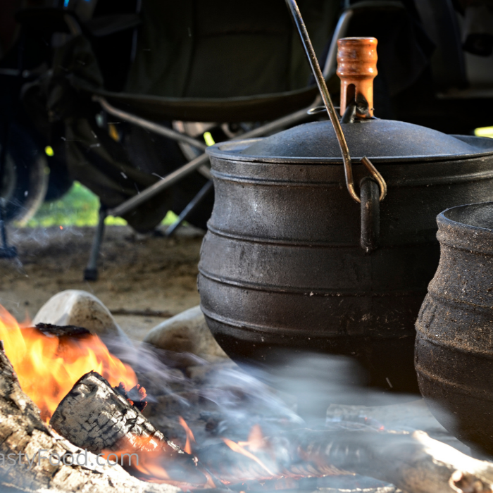 Filling Lamb Shank Potjie Pot. A Braai recipe for food cooked all together in a cast iron pot. South africans call it a potjiekos. meal.