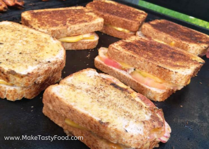 Toasted Braai Grilled Sandwiches with tomato onion cheddar cheese and chutney. 