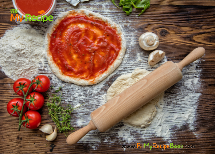 ready homemade pizza base with tomato paste 

