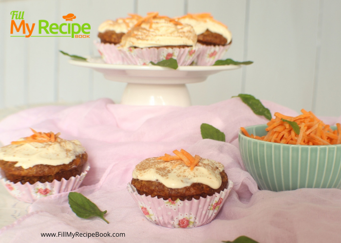 Carrot Cupcakes and Cream Cheese Frosting. Soft and moist scrumptious filled with pineapple and cinnamon with dash of cocoa dusted on top .