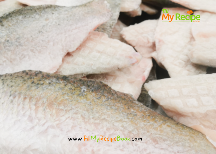 fresh fish fillets to fry. Fried Fish and Chips with Salad recipe idea. Best battered fried fish fillets with sides of chips, Greek salad and lemon, fresh from the sea.