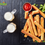 Easy Cheese Straws Recipe idea to bake for an appetizer or snack. The 4 ingredient mix form a crispy savory cheese cracker stick for parties.