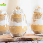 Easy Pumpkin Cream Parfait Recipe dessert for Thanksgiving. Layered with crushed chocolate chip biscuit, pumpkin cream cheese and cream.