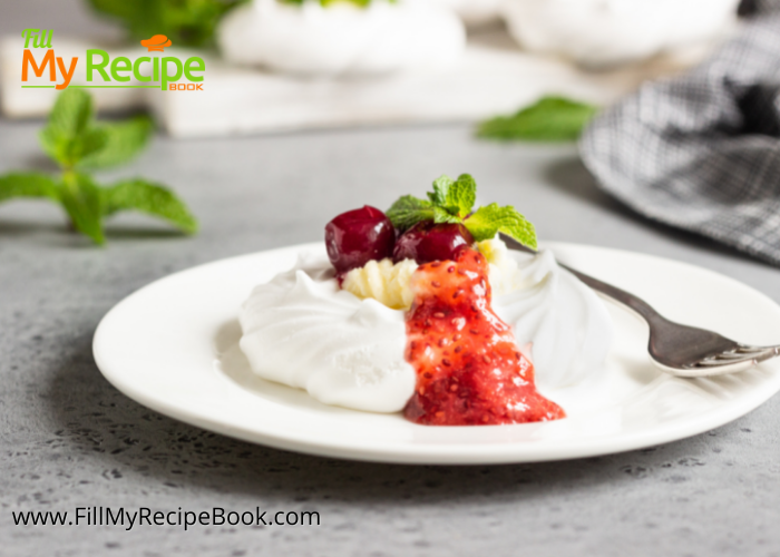 Bake this stunning Mini Pavlova Cherries & Cream Cheese Filling with strawberry sauce recipe for a fine dining gourmet fancy dessert idea.