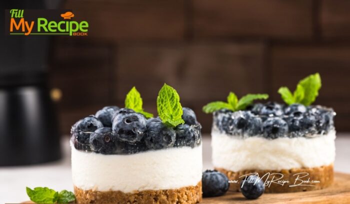 Mini Blueberry Cheesecake Tartlets Recipe. Easy homemade oven bake with a biscuit base and a creamy cream cheese filling with blueberries on.