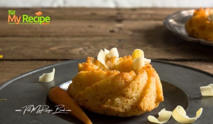 Mini Carrot Cake with White Chocolate recipe idea. A mini Bundt shape bite for a fine dining dessert, topped with shaved white chocolate.