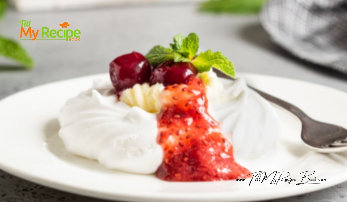 Bake this stunning Mini Pavlova Cherries & Cream Cheese Filling with strawberry sauce recipe for a fine dining gourmet fancy dessert idea.