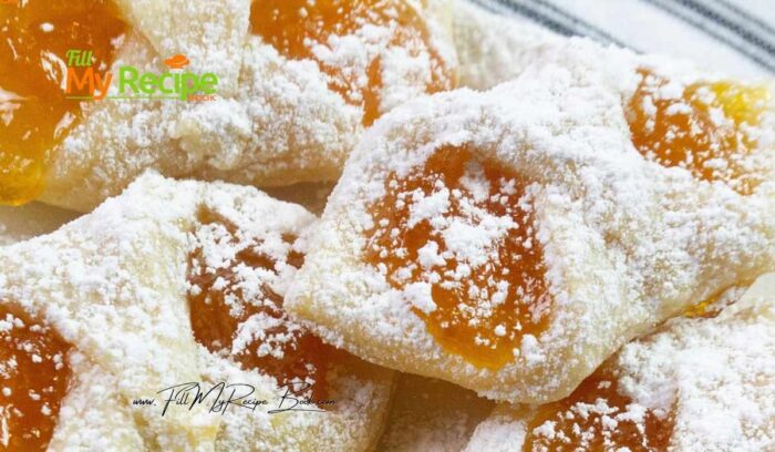 Polish Kolaczki Cookies Recipe. An easy authentic dessert or snack, dough made with cream cheese and butter, filled with apricot jam.