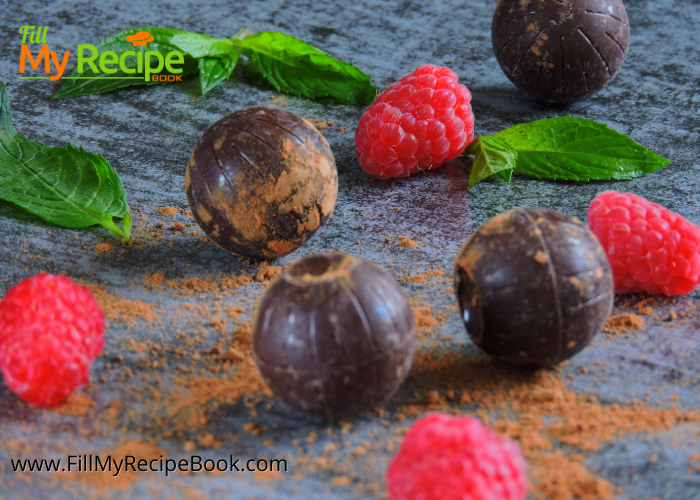 Raspberry Dark Chocolate Truffles. A no bake recipe to easily make with freeze dried and powdered raspberries, dark chocolate rolled in cocoa.