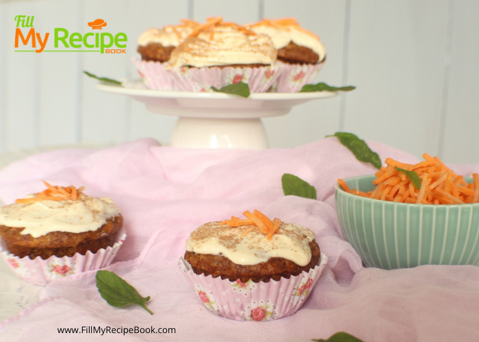 Carrot Cupcakes and Cream Cheese Frosting. Soft and moist scrumptious filled with pineapple and cinnamon with dash of cocoa dusted on top .
