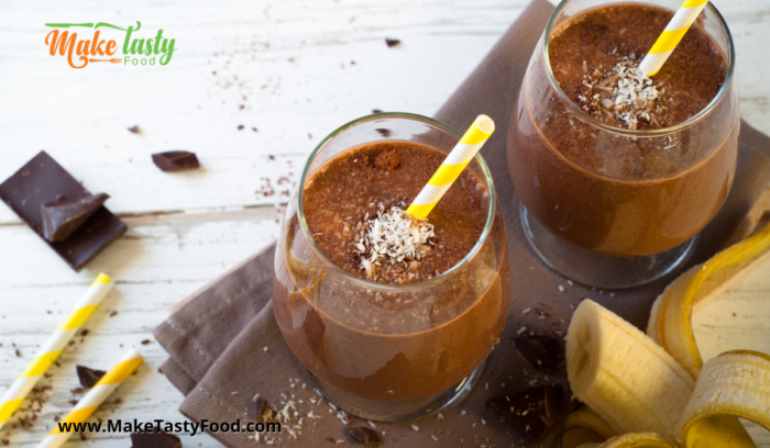 Chocolate Banana Breakfast Smoothie made with raspberries and Greek yogurt and then add chocolate protein powder or cocoa for taste.