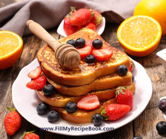 French Toast with Blueberries and Strawberries. A special occasion breakfast to be made adding berries and honey.