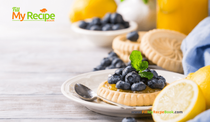 A mini Lemon Curd and Blueberry Tartlets Recipe. Oven baked dessert with shortbread crusts, filled with tangy lemon curd and blueberries.
