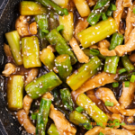 Easy Chicken Asparagus Stir fry summer recipe idea is a healthy and simple dish that is quick to put together for a meal with a savory sauce.