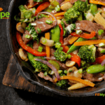 Summer Beef Strips Stir Fry recipe. An easy and quick healthy warm meal for lunch or dinner for a family with vegetables and steak and sauce.