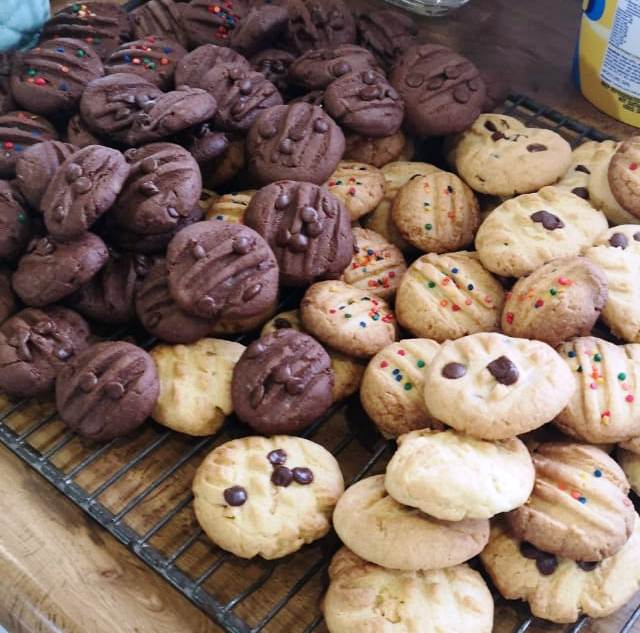 Popular Family Butter Biscuits recipe made in large quantity. Best Vanilla or chocolate biscuits decorated with sprinkles for Christmas.