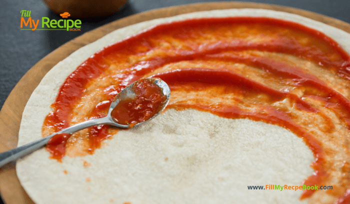 tomato pizza base for Homemade Pepperoni Cheese Pizza thick edge crust recipe for the family. Easy and great weekend lunch or dinner for family and kids.