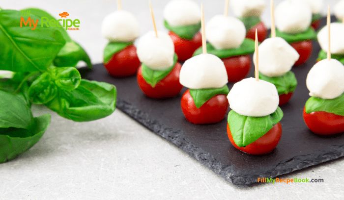 Mini Caprese Salad Skewers recipe idea for an appetizer, using cocktail toothpicks for a finger food, served with a reduced balsamic vinegar.