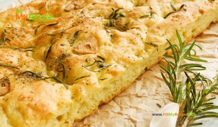 Garlic Rosemary Focaccia Bread Machine Recipe. A bread machine dough for an easy oven bake side with fresh rosemary and herbs topping.
