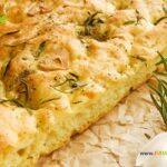 Garlic Rosemary Focaccia Bread Machine Recipe. A bread machine dough for an easy oven bake side with fresh rosemary and herbs topping.