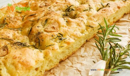 Garlic Rosemary Focaccia Bread Machine Recipe. A bread machine dough for an easy oven bake side with fresh rosemary and herbs topping.