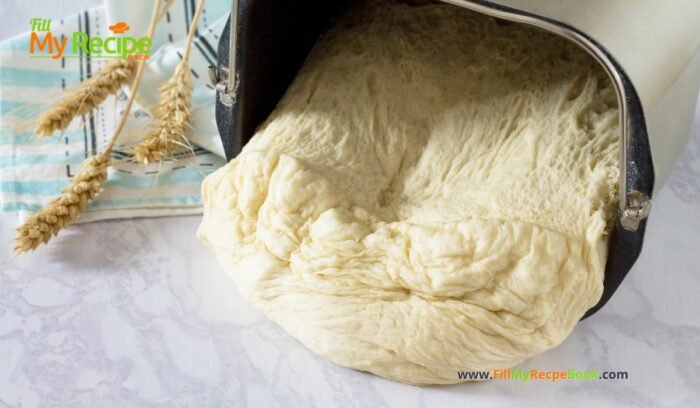Garlic Rosemary Focaccia Bread Machine Recipe. A bread machine dough for an easy oven bake side with fresh rosemary and herbs topping.