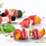 Mini Salami Feta Peach Skewer recipe ideas with fruit and fresh cold salad and feta appetizers. A cocktail party finger food for a crowd.