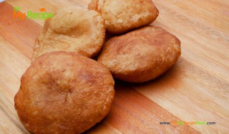 Bobotie Filled Vetkoek Pockets Recipe idea. Popular South African recipes to make for snack or a meal with bobotie mince, and vetkoek.