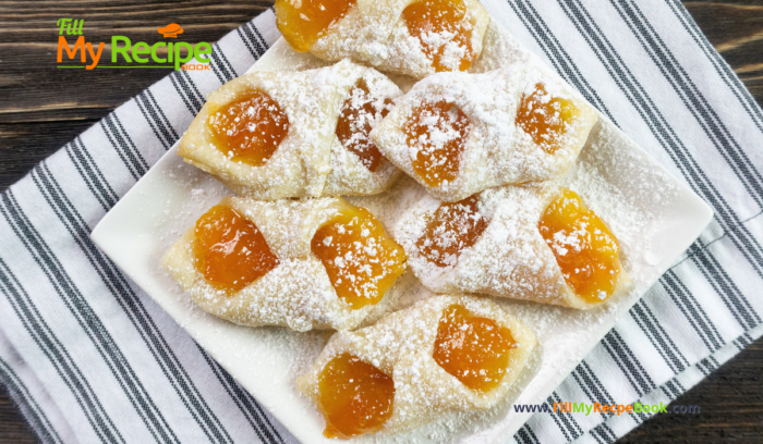 Polish Kolaczki Jam Cookies recipes are so delicious. Made with cream cheese in dough and filled with apricot jam for an aesthetic snack.