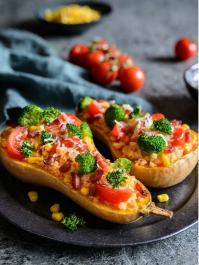 Butternut Squash Stuffed and Roasted recipe with vegetables, rice, bacon and cheese. An oven roast that is a healthy side dish with a meal.