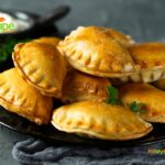 A Homemade Savory Hand Pies recipe idea that is flaky from the puff pastry with a tasty filling of saucy ground beef, veggies and potato.