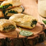 Puff Pastry Spinach and Feta Rolls recipe idea to create for party, appetizers. Mini Savory sausage rolls that are vegetarian friendly snacks.