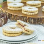 Homemade Linzer Raspberry Jam Cookies treats combine rich buttery goodness with a hint of almond, filled with raspberry jam for holidays.