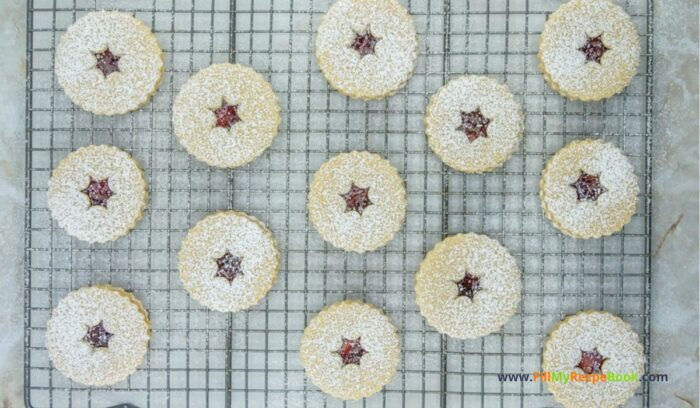 Homemade Linzer Raspberry Jam Cookies treats combine rich buttery goodness with a hint of almond, filled with raspberry jam for holidays.