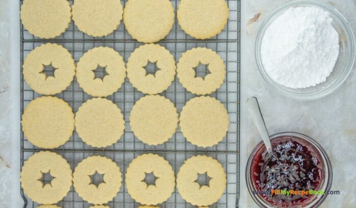 Homemade Linzer Raspberry Jam Cookies treats combine rich buttery goodness with a hint of almond, filled with raspberry jam for holidays.