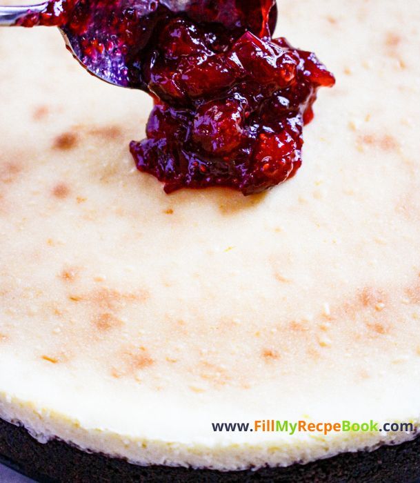 topping on cream cheese filling, Chocolate Crusted Cranberry Orange Cheesecake recipe idea to create for thanksgiving or Christmas, cookie base oven bake dessert.